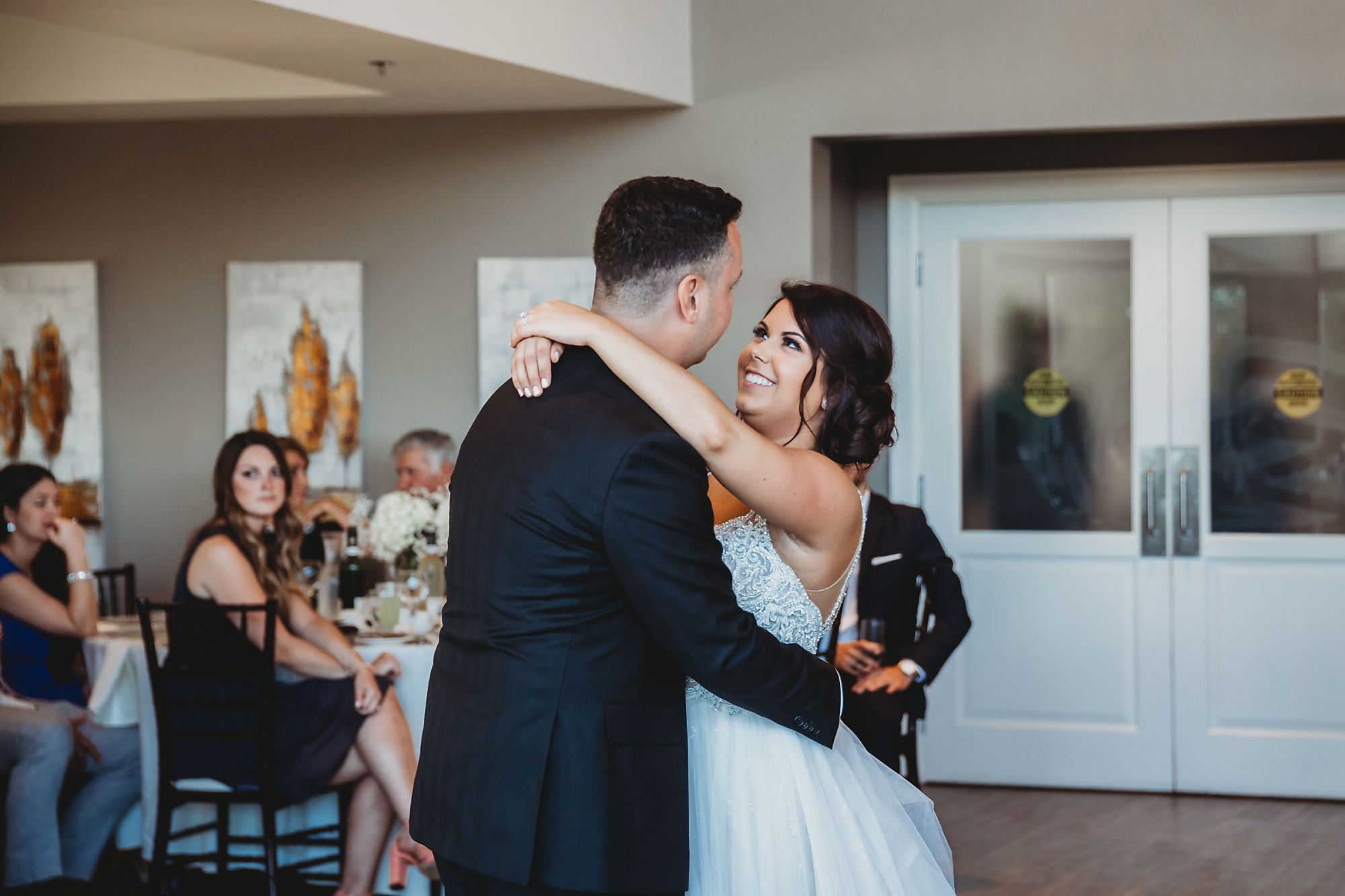 The bride and grooms first dance at Dundas Golf and Curling Club in Hamilton, Ontario.