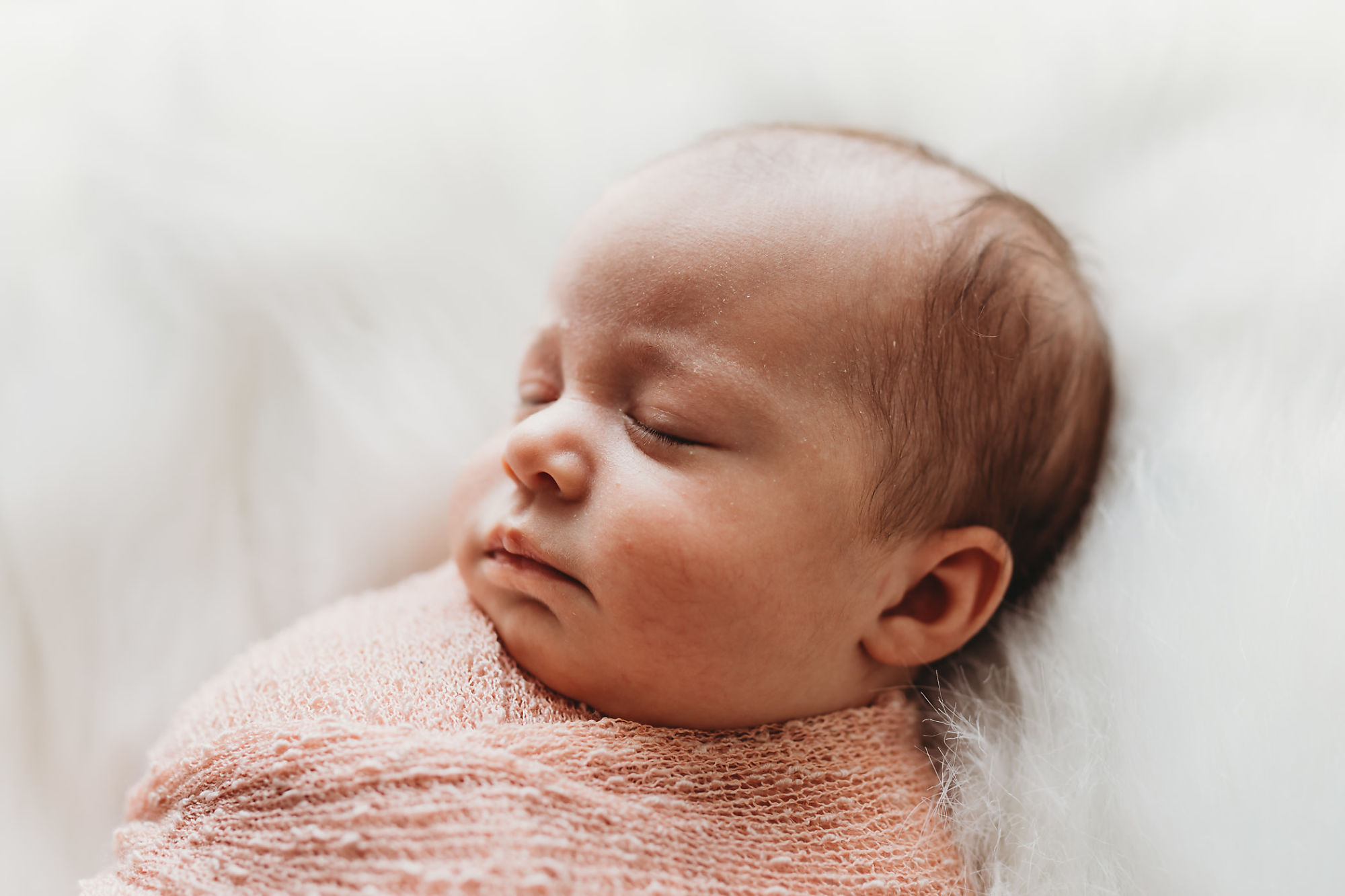 Lifestyle Hamilton Newborn Photographer Jennifer Blaak captures baby in a gentle moment of rest during this newborn photography session in Hamilton.