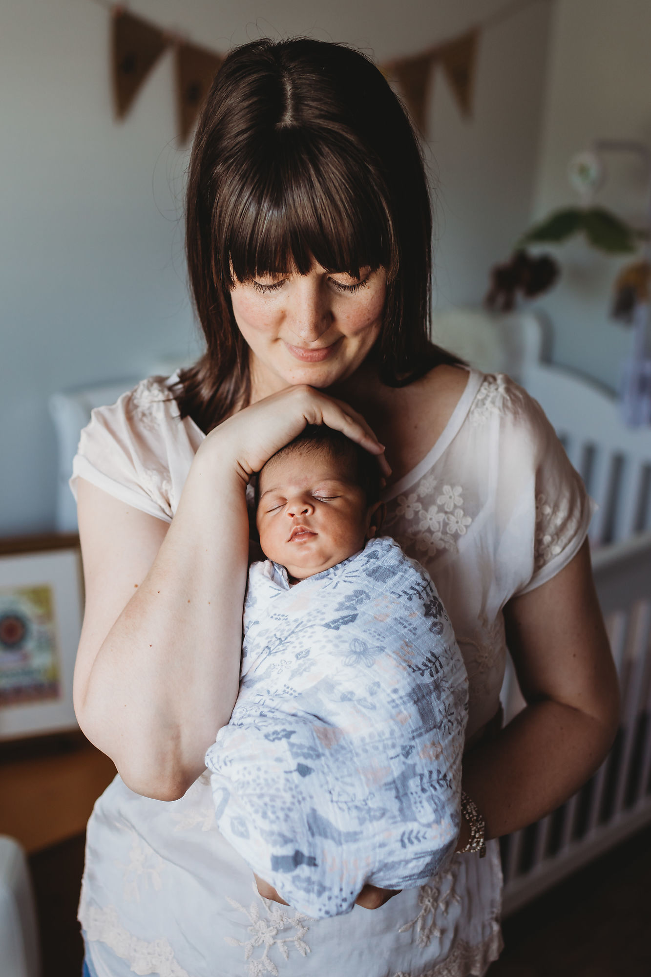 Portrait of mother and baby. Lifestyle newborn photography session with Guelph Newborn Photographer Jennifer Blaak.