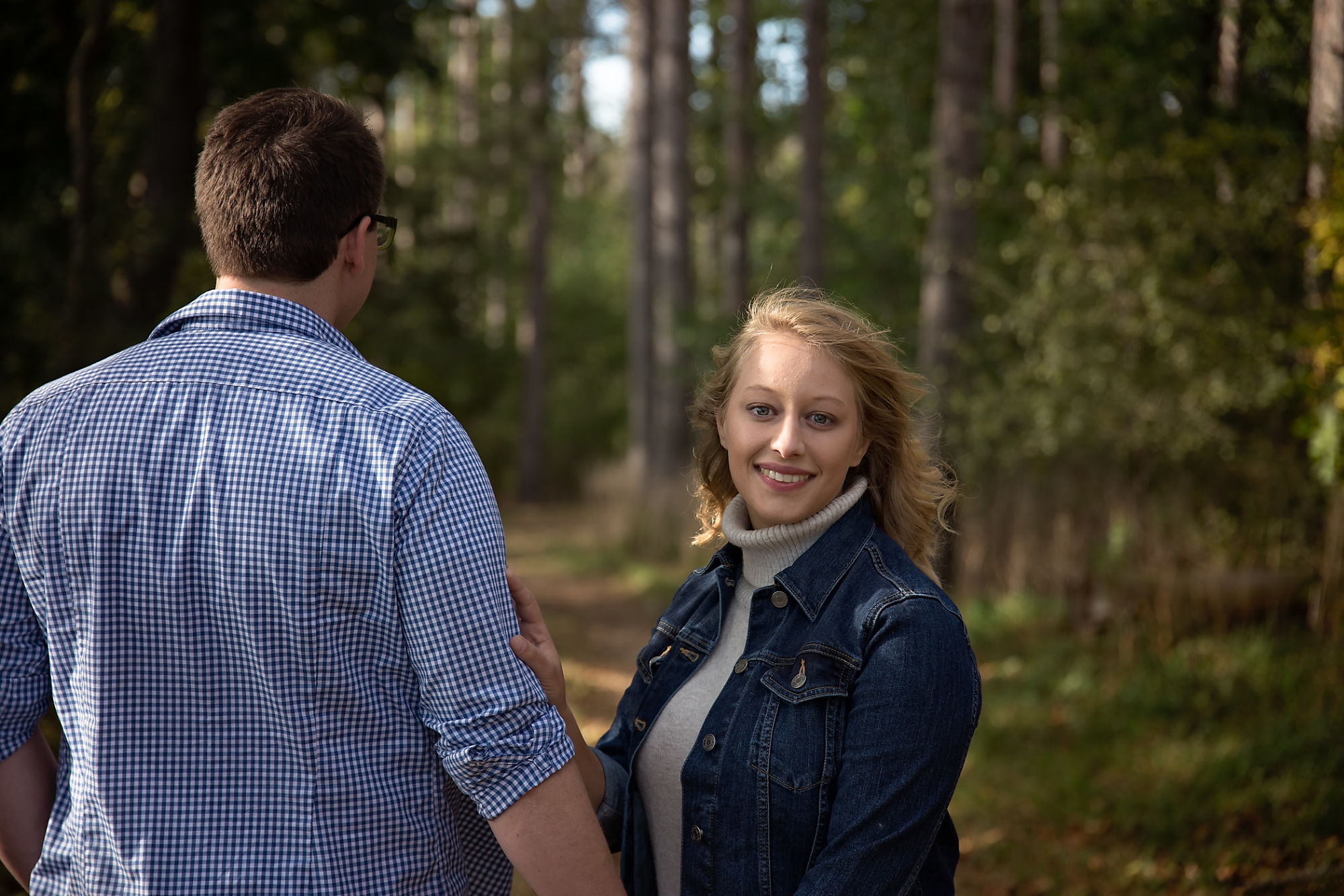 Couple Kaitlyn and Nick in the forest during their engagement shoot with Waterdown Engagement Photographer Jennifer Blaak.