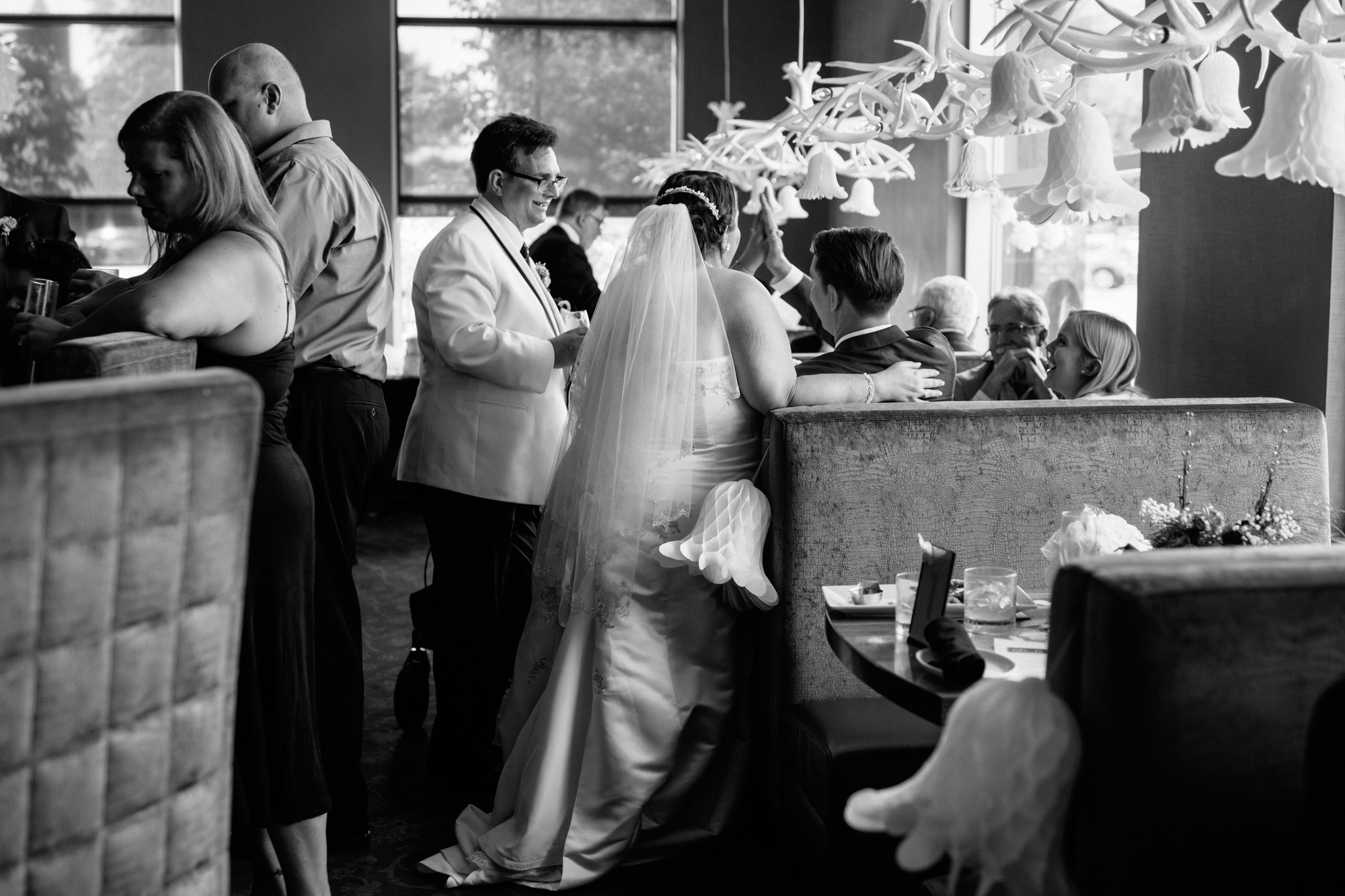 Black and white photo CHOP steakhouse intimate wedding reception. Mississauga wedding photographer Jennifer Blaak.