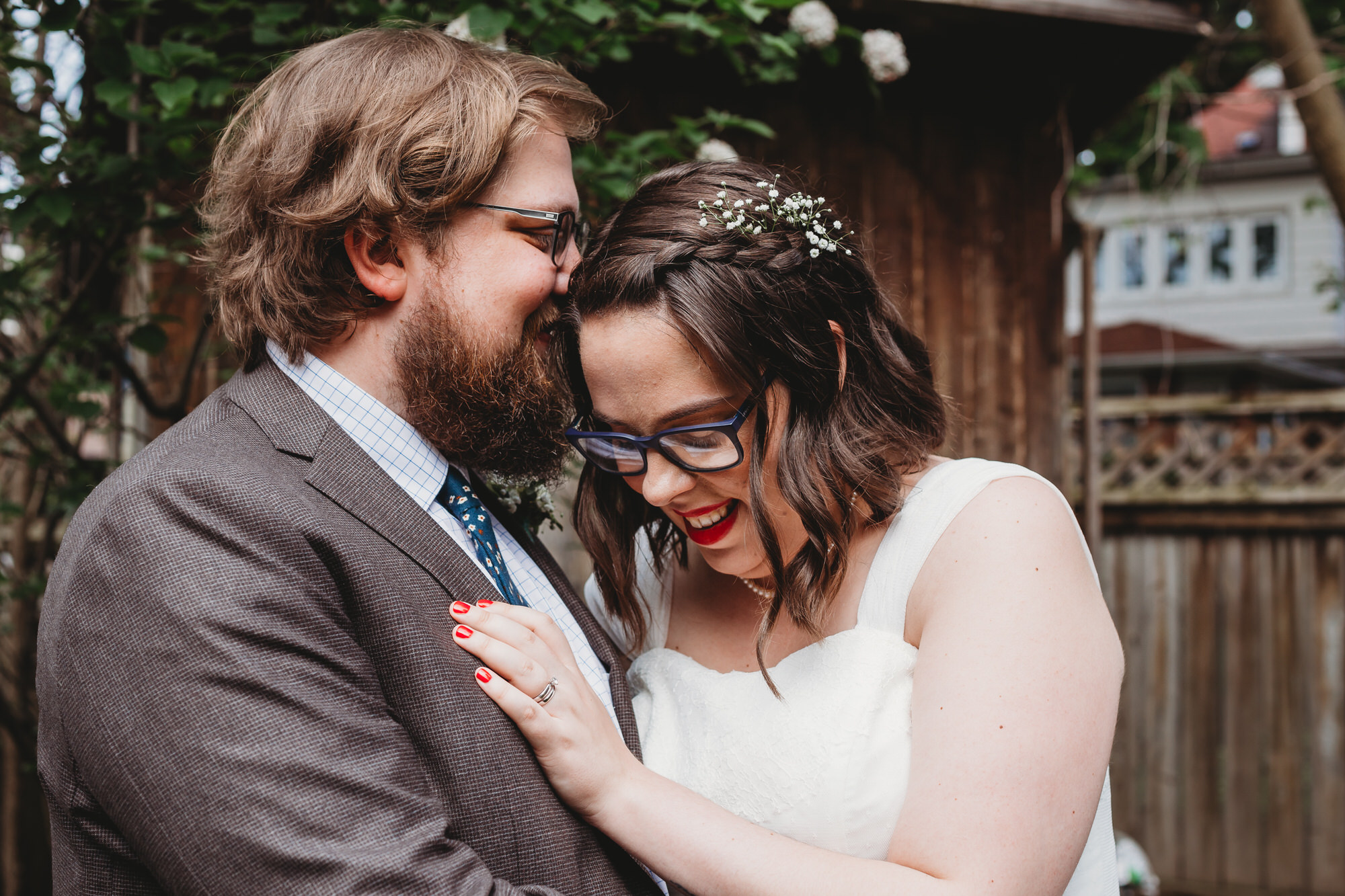Hamilton Wedding Photographer - Bride and groom embrace.