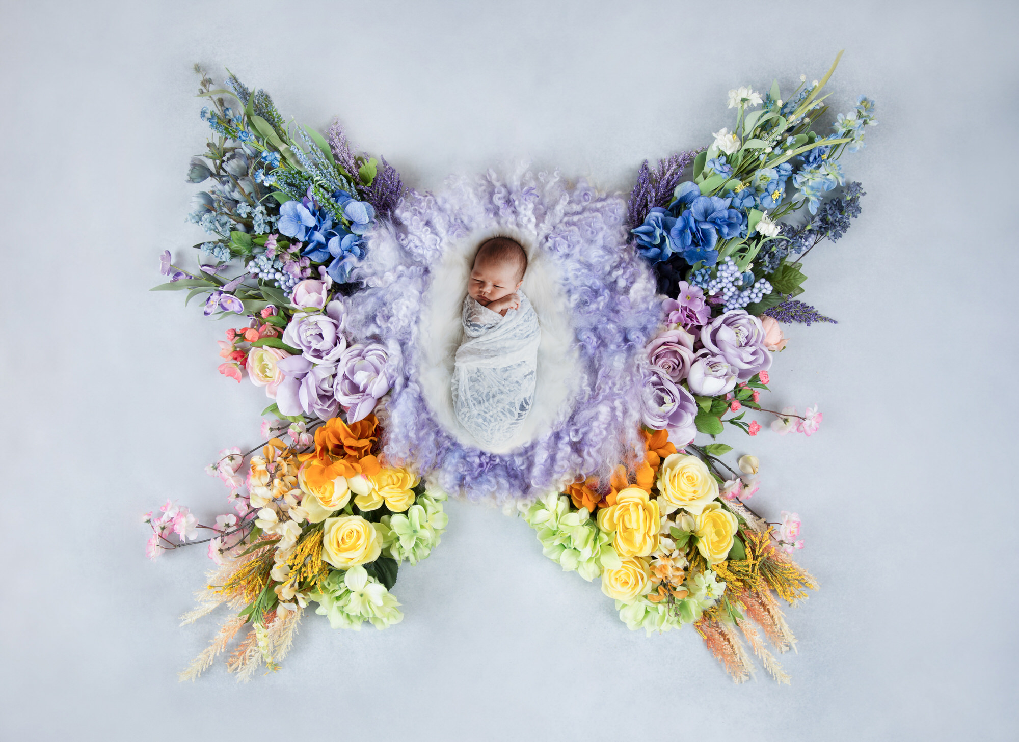 Tillsonburg Newborn Photographer - new born with rainbow flowers
